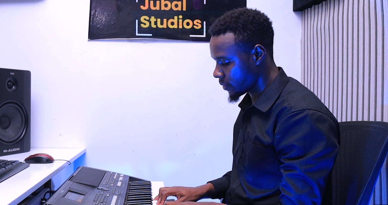 Producer at the mixing console in a recording studio